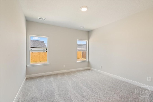 330 Crosswinds Dr, Rincon, GA 31326 - spare room featuring plenty of natural light, carpet floors, and baseboards