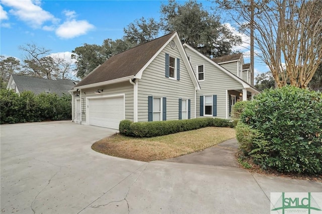 view of property exterior featuring a garage