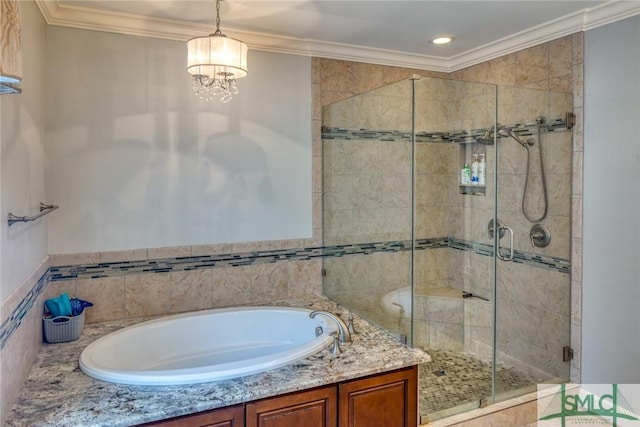 bathroom featuring an inviting chandelier, ornamental molding, and separate shower and tub