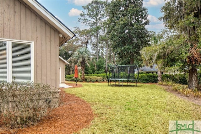 view of yard featuring a trampoline