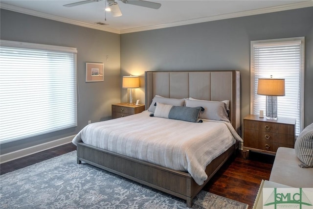 bedroom with ornamental molding, dark wood-type flooring, and ceiling fan