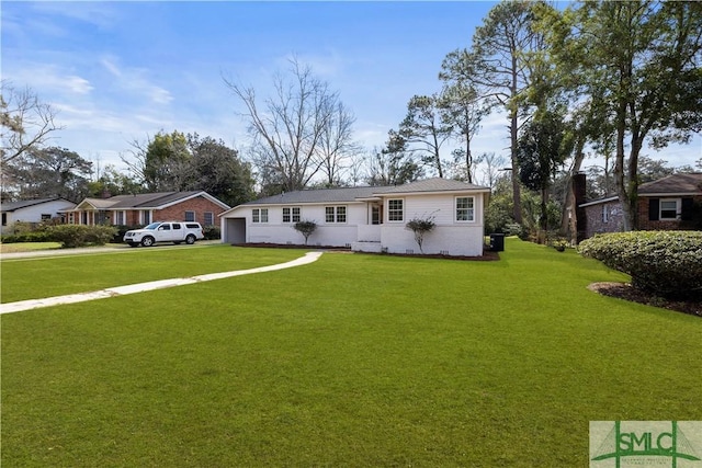 single story home featuring a residential view and a front yard