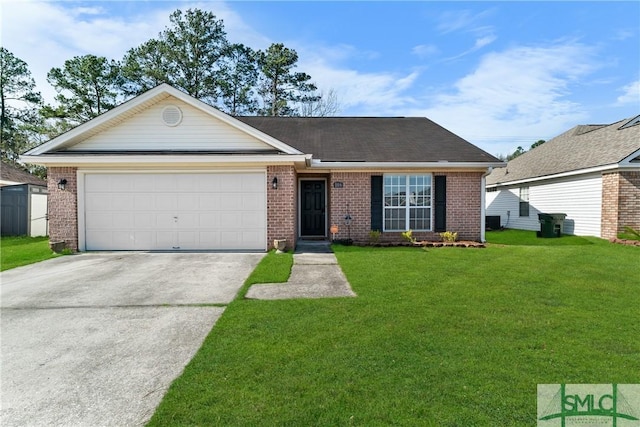 view of front of property with a garage and a front lawn