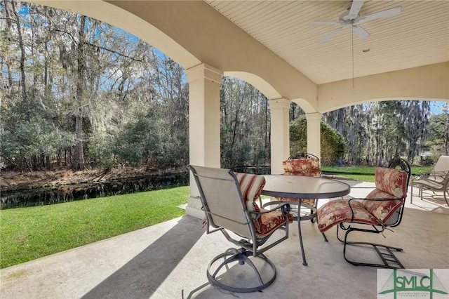 view of patio / terrace featuring ceiling fan