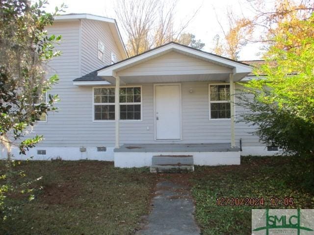 view of front of home featuring covered porch