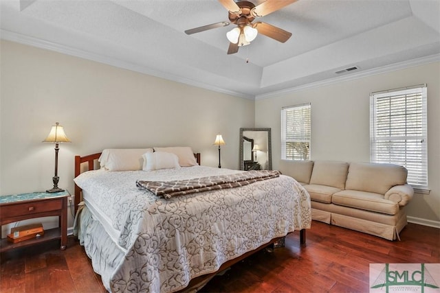 216 Olde Towne Rd, Savannah, GA 31410 - bedroom with a tray ceiling, wood-type flooring, crown molding, baseboards, and ceiling fan