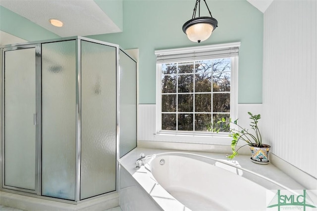 216 Olde Towne Rd, Savannah, GA 31410 - full bath featuring a shower stall, a bath, and a wainscoted wall