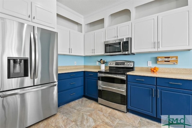 216 Olde Towne Rd, Savannah, GA 31410 - kitchen featuring appliances with stainless steel finishes, blue cabinets, light countertops, light stone finish flooring, and white cabinetry