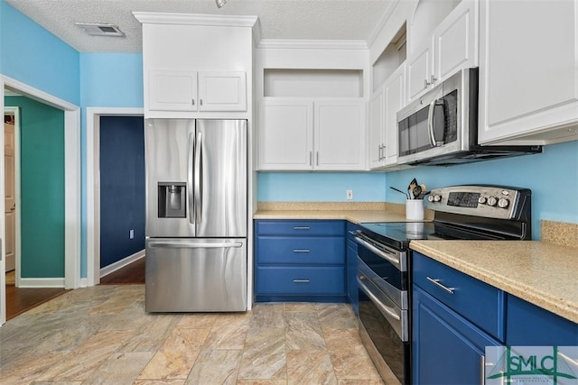 216 Olde Towne Rd, Savannah, GA 31410 - kitchen featuring stainless steel appliances, blue cabinetry, open shelves, light countertops, and white cabinetry