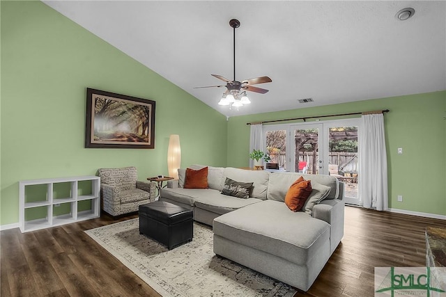 living room featuring french doors, ceiling fan, lofted ceiling, and dark hardwood / wood-style floors