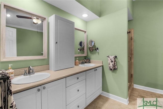 bathroom with an enclosed shower, vanity, tile patterned floors, and ceiling fan