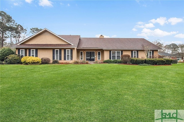 single story home with a front yard