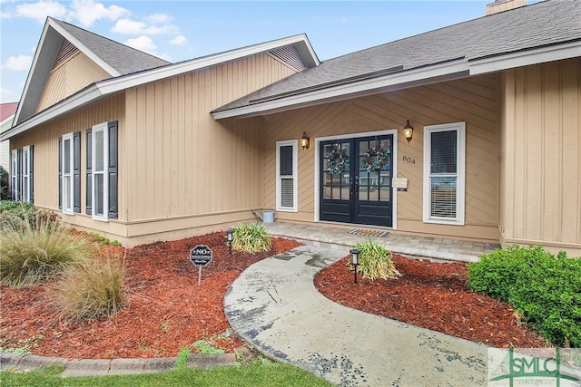 view of exterior entry with french doors