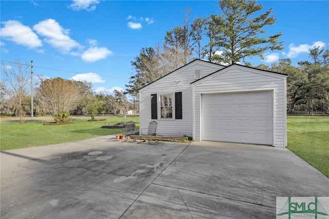 garage with a lawn