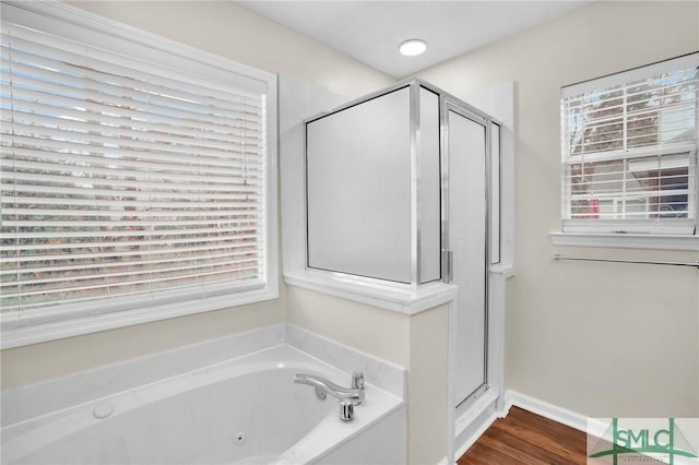 209 Mariners Way, Savannah, GA 31419 - bathroom featuring a shower stall, a tub with jets, wood finished floors, and baseboards