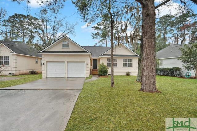 209 Mariners Way, Savannah, GA 31419 - view of front of home featuring concrete driveway, a front lawn, a garage, and stucco siding