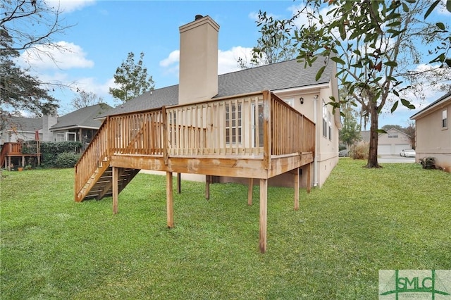 209 Mariners Way, Savannah, GA 31419 - back of house featuring a chimney, a lawn, roof with shingles, and a deck