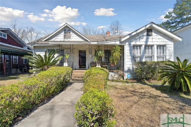 bungalow-style house featuring covered porch