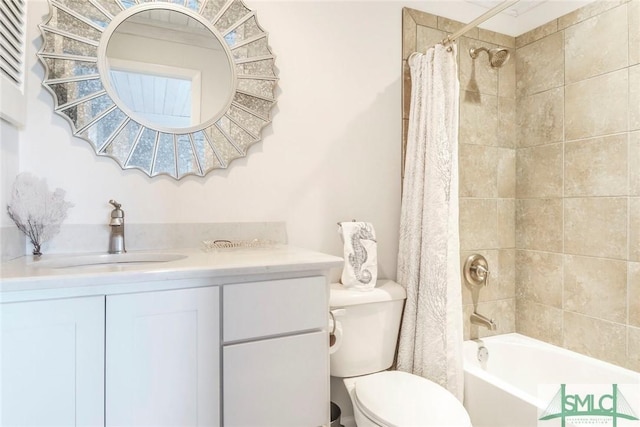 full bathroom with vanity, toilet, and shower / bath combination with curtain