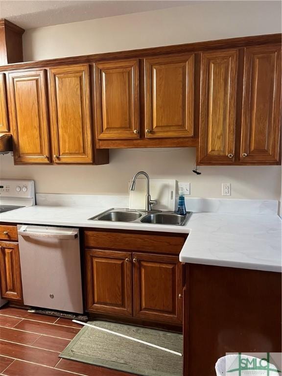 kitchen with sink, white electric range oven, and dishwasher