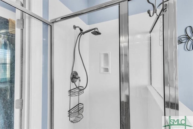 bathroom featuring walk in shower