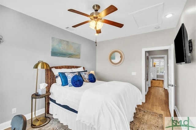 bedroom featuring ceiling fan and light wood-type flooring