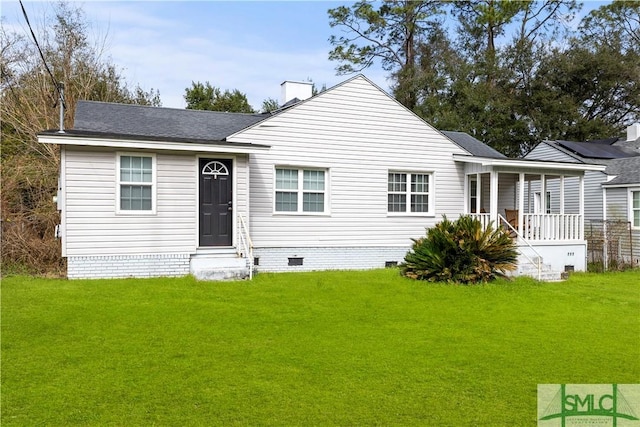 view of front facade with covered porch and a front yard