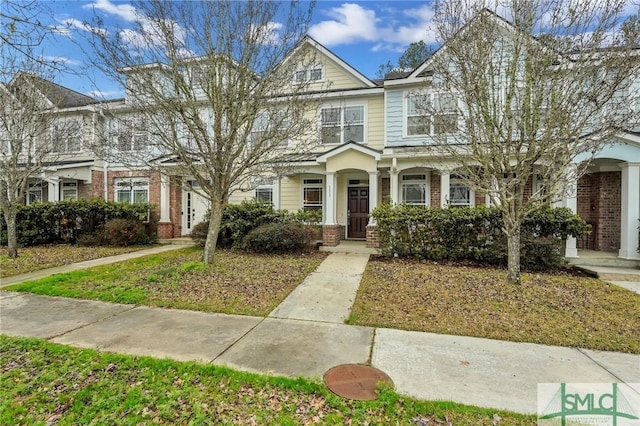 multi unit property featuring brick siding