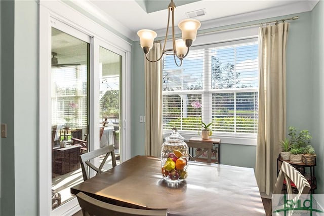 dining area featuring a chandelier