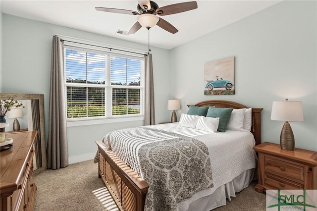 carpeted bedroom featuring ceiling fan