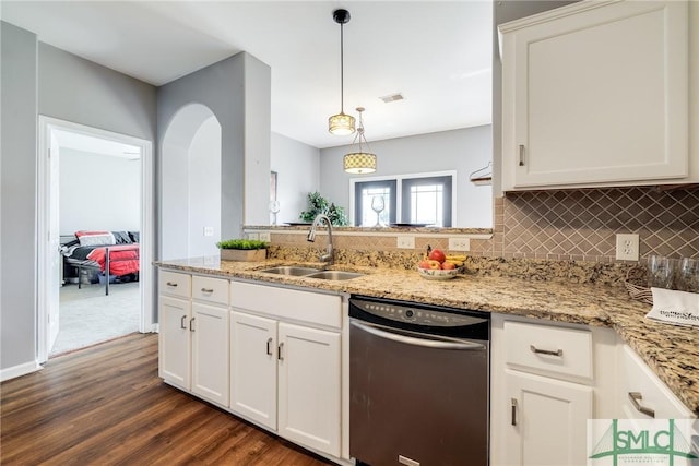 kitchen with sink, black dishwasher, white cabinetry, and pendant lighting