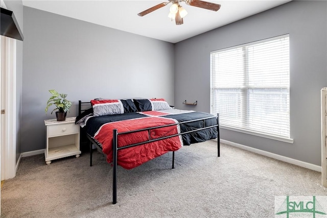 carpeted bedroom featuring ceiling fan