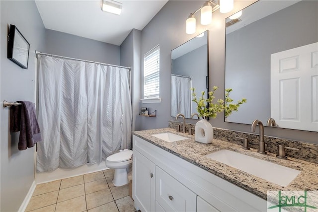 full bathroom featuring tile patterned flooring, vanity, toilet, and shower / bathtub combination with curtain