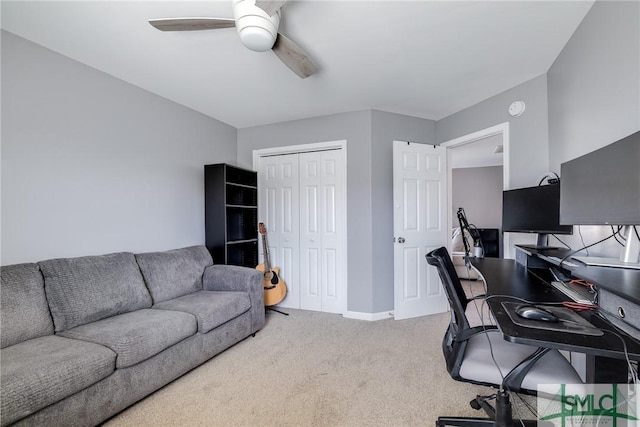 office with ceiling fan and carpet flooring