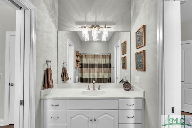 bathroom with a shower with curtain and vanity