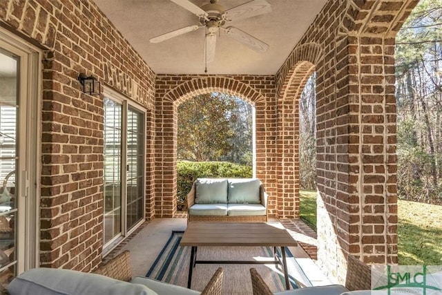 view of patio / terrace featuring ceiling fan