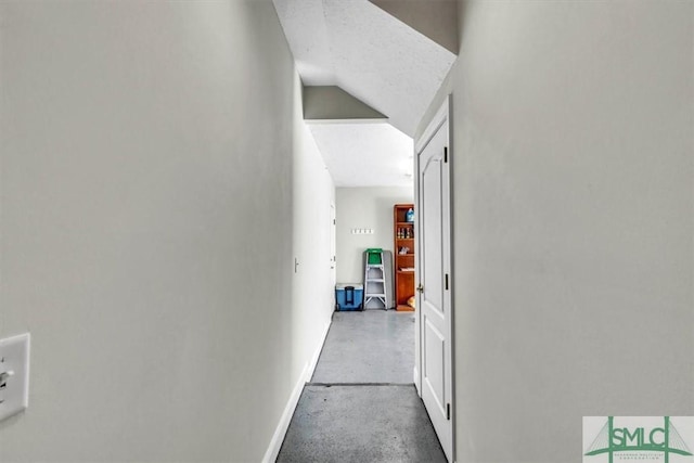 corridor featuring concrete floors