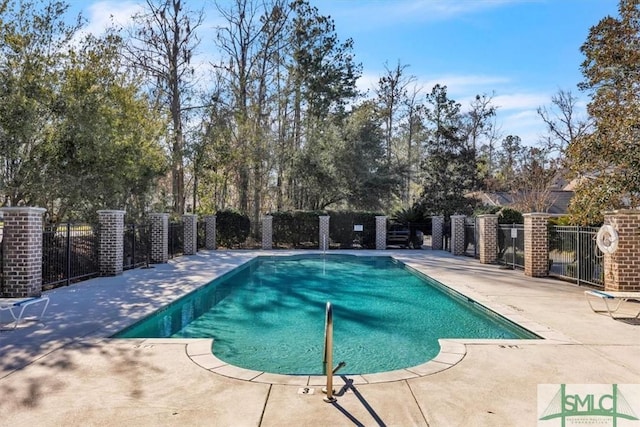 view of swimming pool featuring a patio