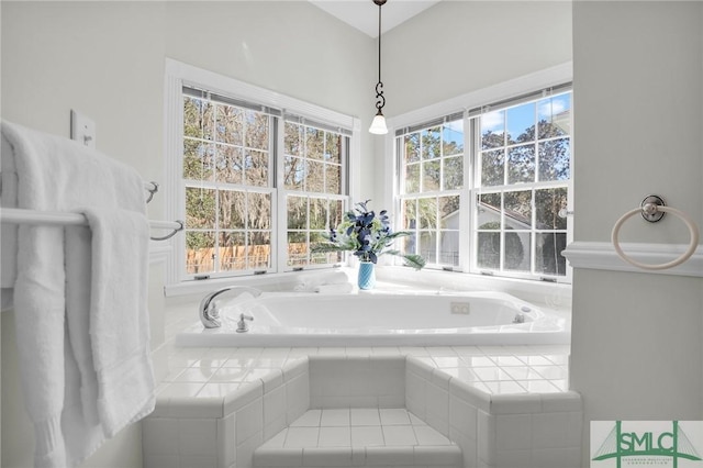 bathroom with tiled bath