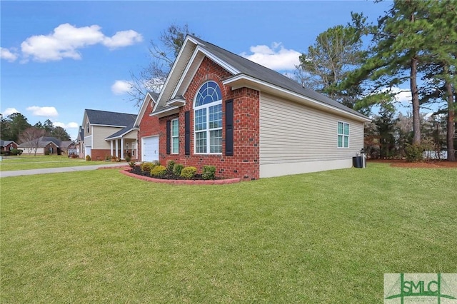 view of home's exterior with a lawn and a garage