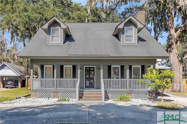 cape cod home with covered porch