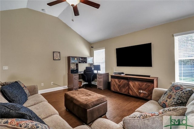 living room featuring lofted ceiling, dark hardwood / wood-style floors, and ceiling fan