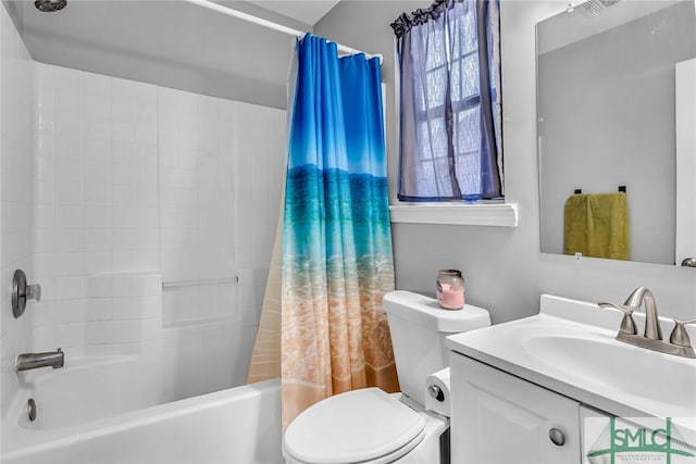 full bathroom featuring toilet, shower / tub combo with curtain, and vanity