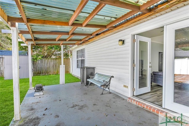 view of patio / terrace featuring a shed