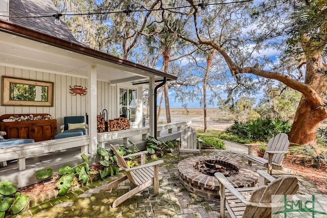 view of patio with an outdoor fire pit