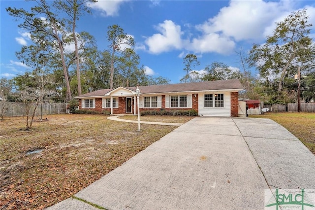 ranch-style house with a front lawn