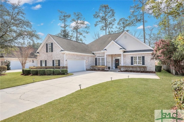 view of front facade with a front lawn and a garage