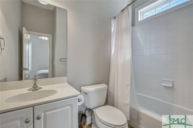 full bathroom with vanity, toilet, and shower / bathtub combination with curtain