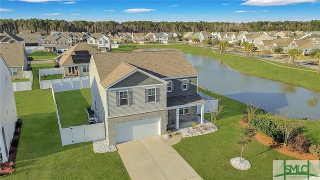 drone / aerial view featuring a water view