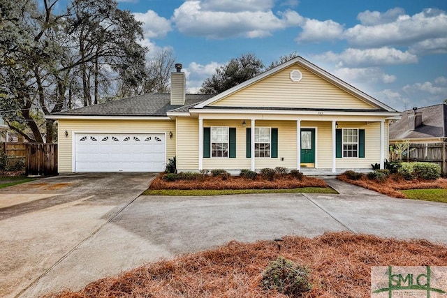 view of front facade featuring a garage and a porch